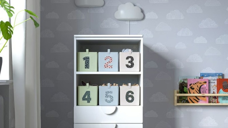 Number storage boxes sitting on a shelf