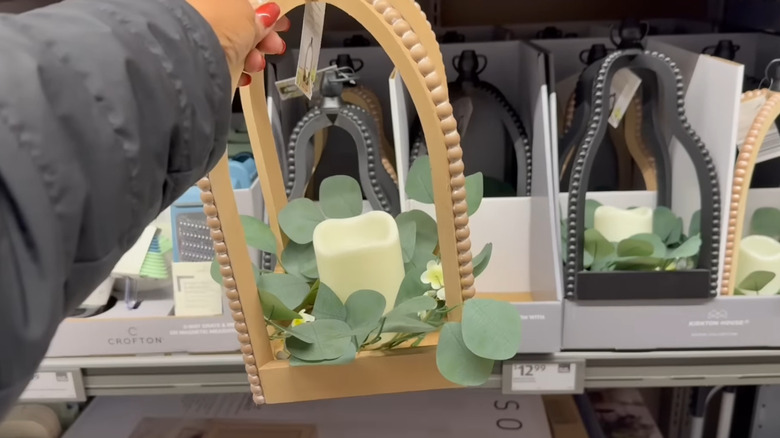 Beige and black beaded lanterns with LED candles