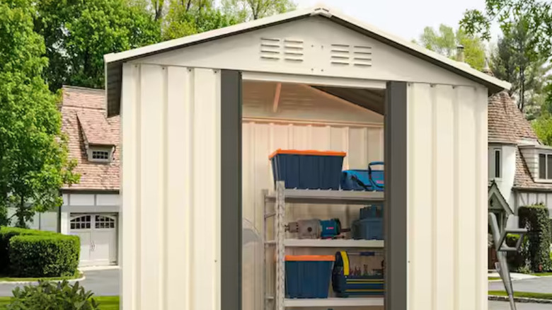 The white Runesay shed with an apex roof.