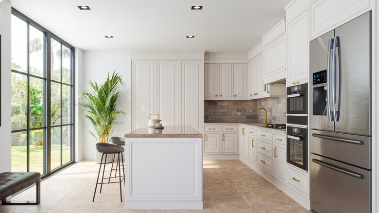 Recessed lighting along ceiling of modern kitchen