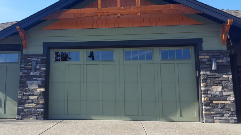 A home's multi-section garage door with windows