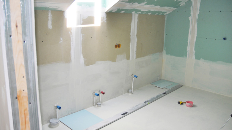 A bathroom is in the middle of being remodeled