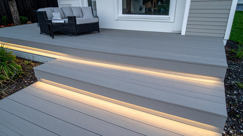 Composite deck stairs with built-in lighting