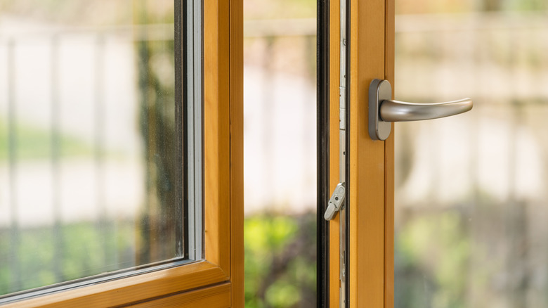 Wood windows opening a bit