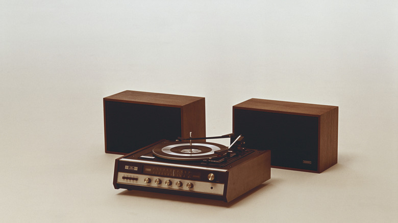 Vintage turntable on white background