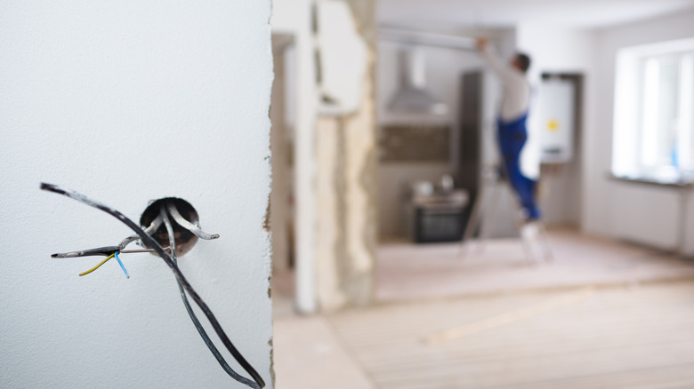 Electrician updating electrics in house