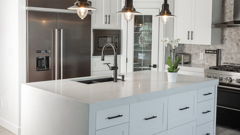 A kitchen island with drawers.