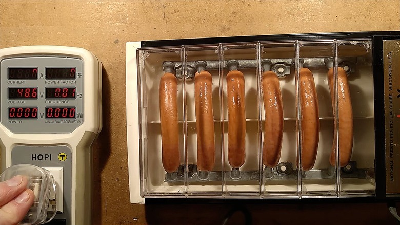 Top-down view of the Hot Dogger with six hot dogs cooking inside
