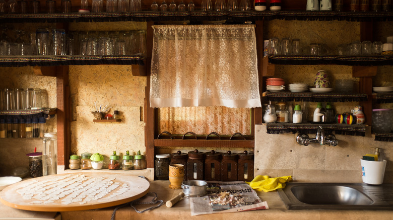 A rustic vintage kitchen full of ingredients and tools