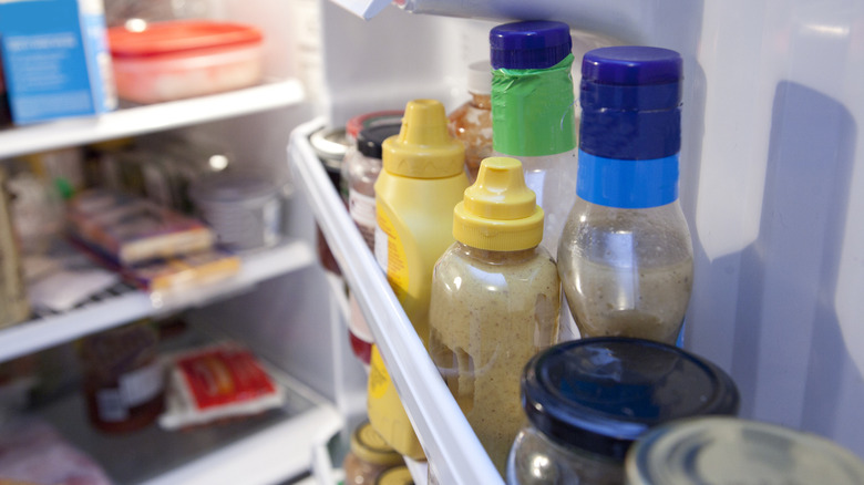 Refrigerator with condiments in the door