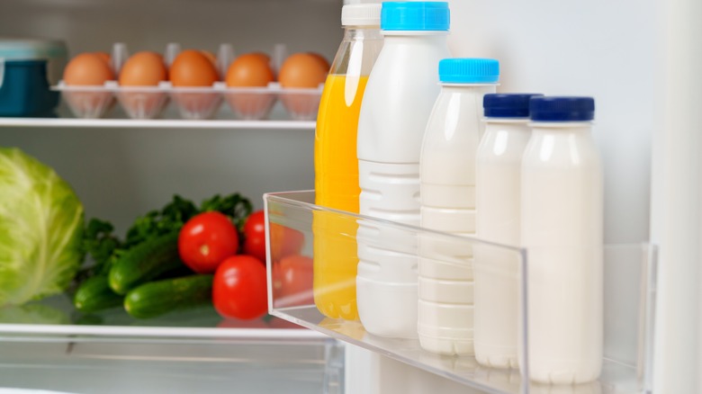 Inside of refrigerator with similar items grouped together