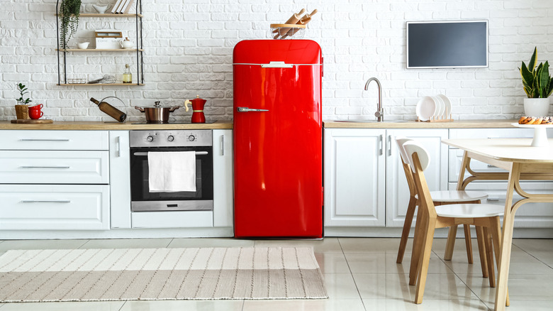 Kitchen with red fridge