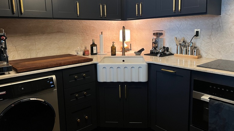 Black cabinets with brass hardware