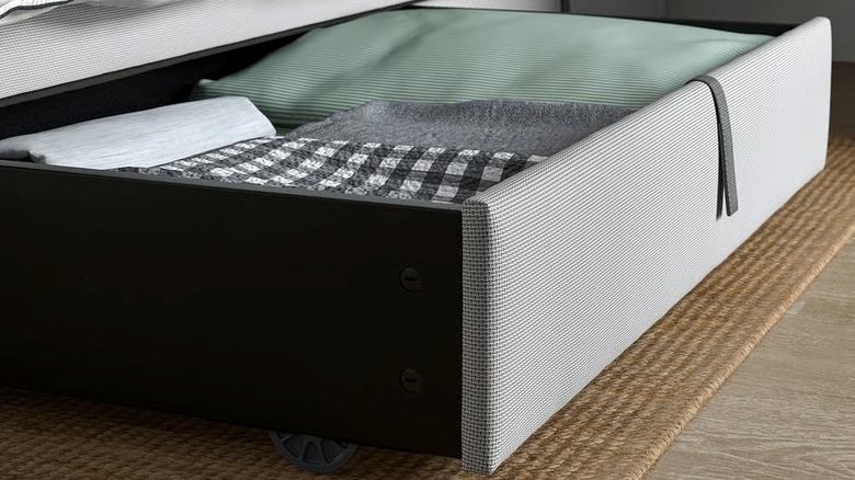 IKEA's GLADSTAD upholstered bed storage box filled with blankets