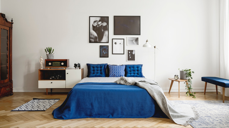 Mid-century modern bedroom with gallery wall
