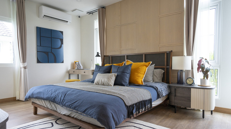 Wooden accents on the wall above the bed
