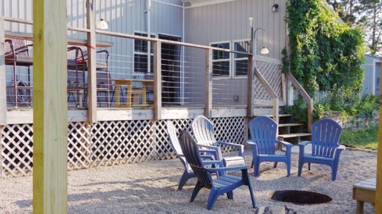 Rasied deck and gravel extension with firepit