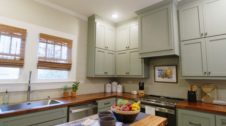 A bright kitchen with beadboard backsplash