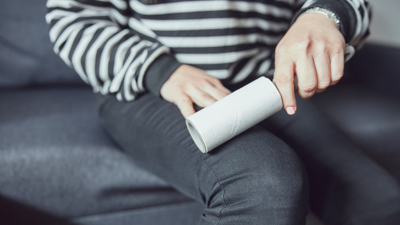 Cleaning pants with lint roller