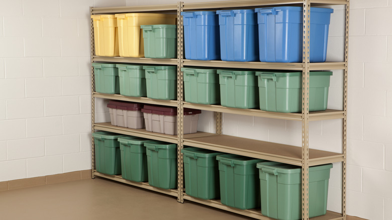 Shelf full of colorful plastic storage bins