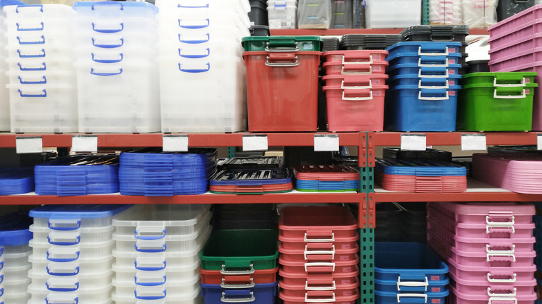 Plastic storage bins in various colors at the store