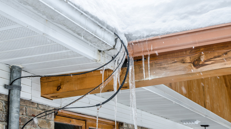 An ice dam at the joint of a roof