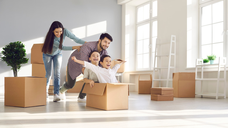 Family with boxes 