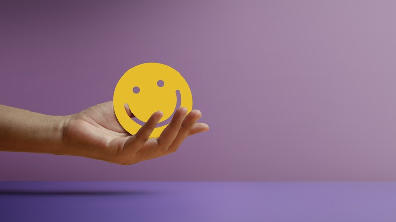 Smiley face in hand