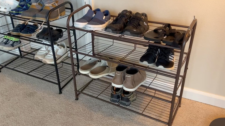 SONGMICS Stackable Shoe Rack with multiple pairs of shoes on it