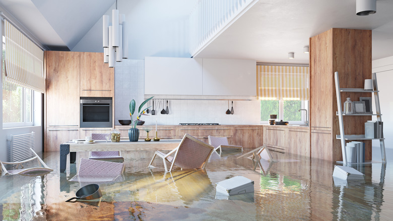 A kitchen flooded with water.