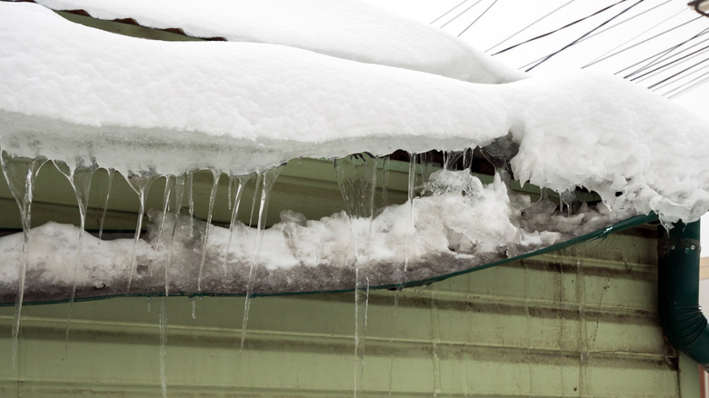 Damage to a drainage system due to snow and ice.
