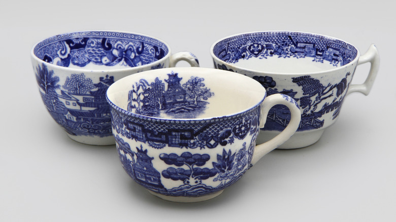Three blue and white china mugs