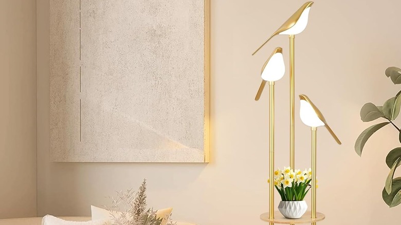 Artmooy Store standing lamp with wall art behind