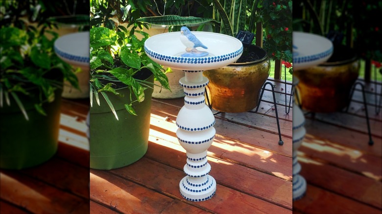 Bird statue in DIY bird bath