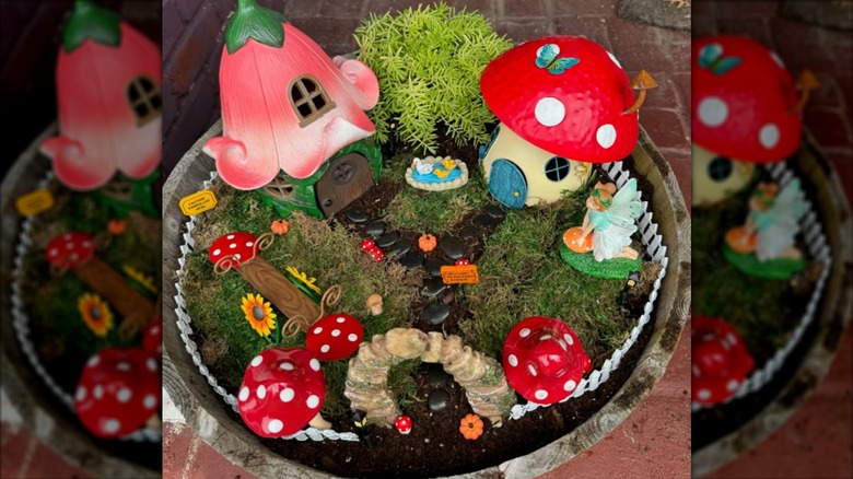 fairy statue in miniature garden