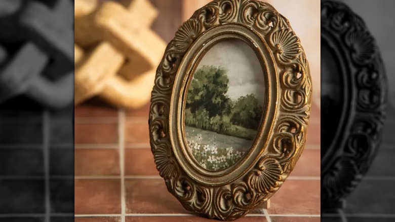 Photo of a landscape in an intricate frame