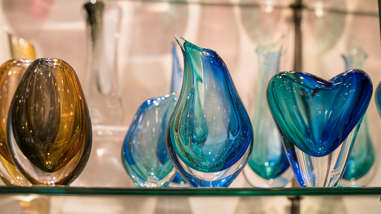 murano glass vases on shelf