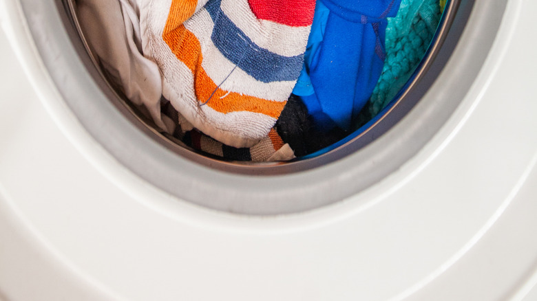 Colorful towels in a dryer drum