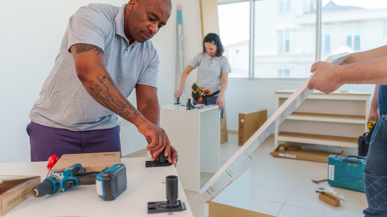 New countertops being installed in a kitchen