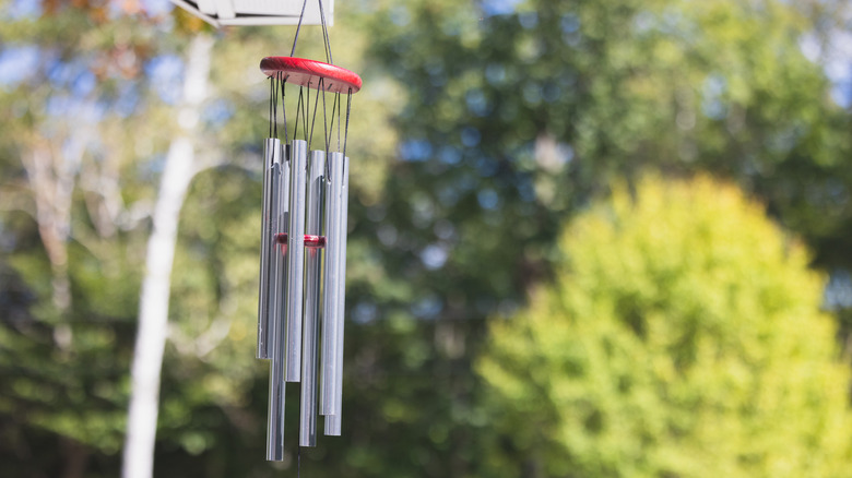Decorative wind chime with red accents