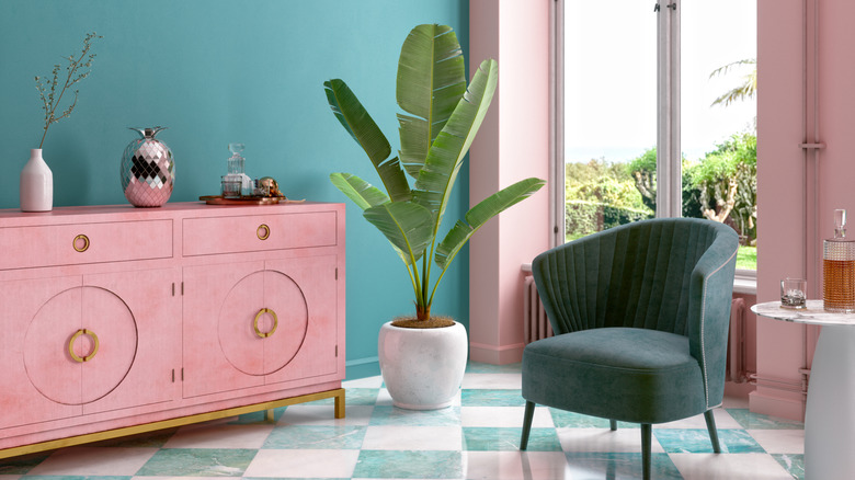 An aqua and pink room decorated in 1980s style