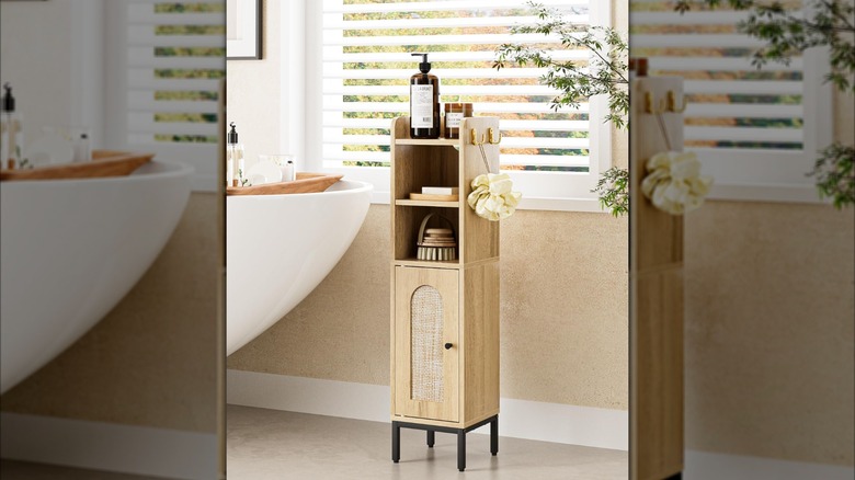 Bathroom cabinet standalone floor hutch with bathroom essentials and loofah