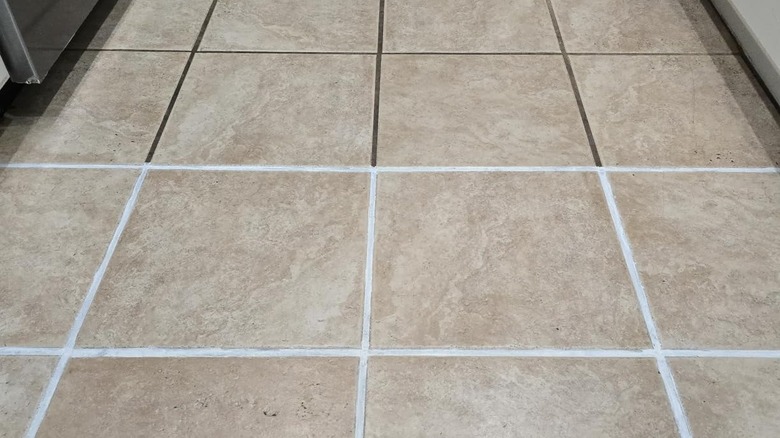 Customer photo of recolored grout lines between beige tiles