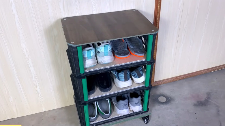 Rolling shoe rack made from plastic crates filled with shoes