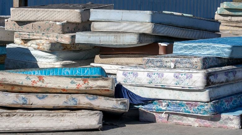 used mattresses in piles