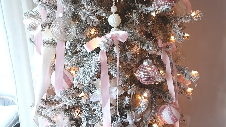 Modern version of a vintage pink tree with subtle pink decorations and bows