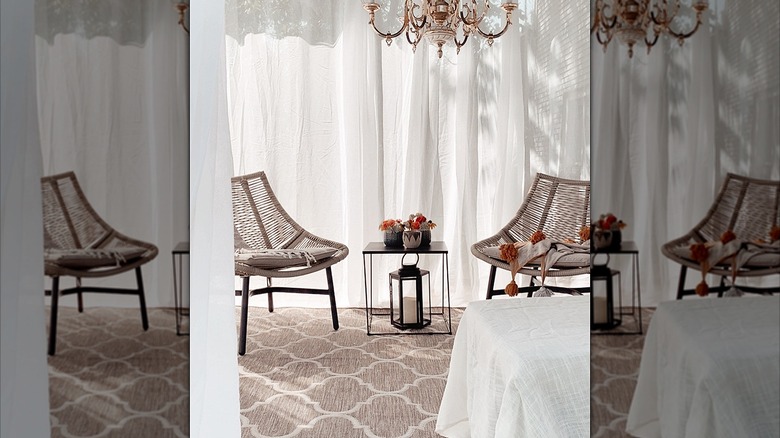 Gauze outdoor curtains with rattan patio furniture