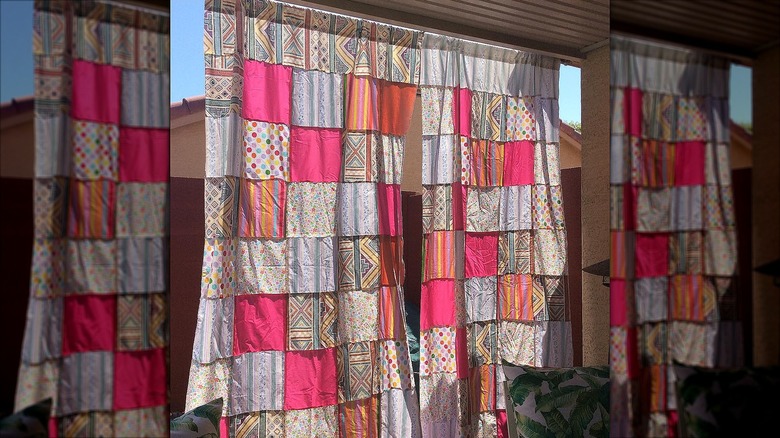 Colorful patchwork outdoor curtains hanging outside