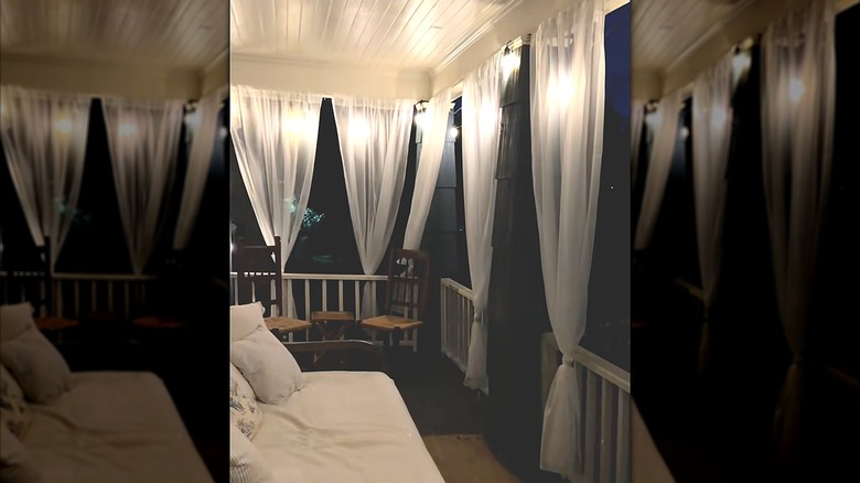 Semi-sheer curtains hanging around a patio
