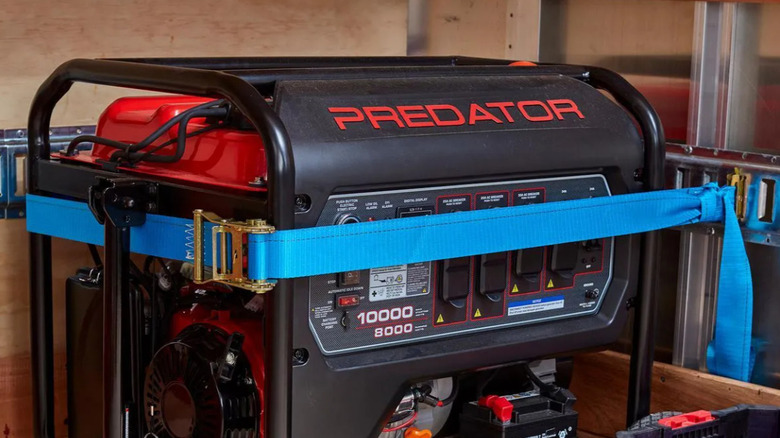 Blue ratchet straps securing appliance